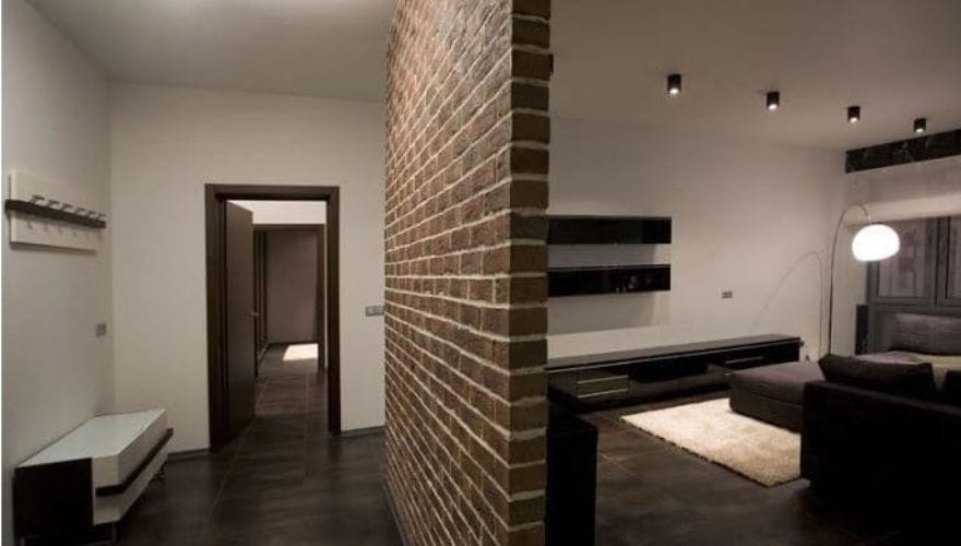 Plain brick partition wall construction with cement mortar