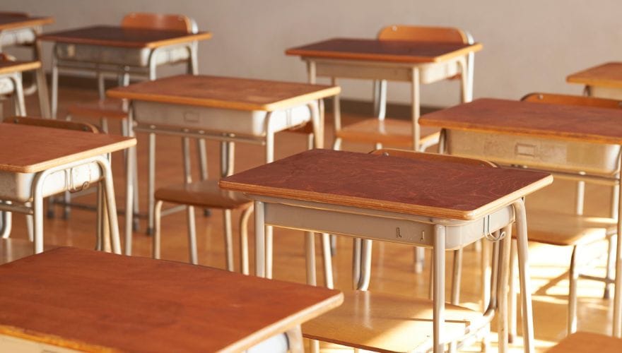 wooden classroom desks and chairs
