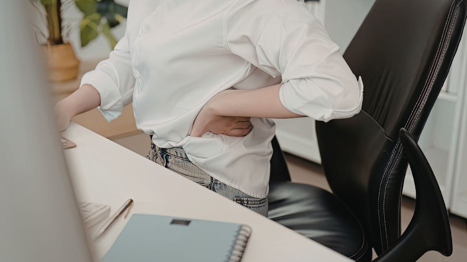 a woman with back pain